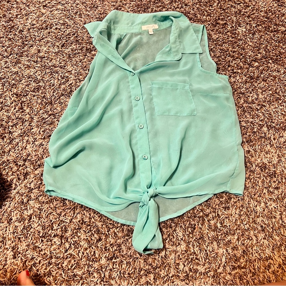 Women’s sheer Delia’s seafoam green sleeveless blouse. Size medium